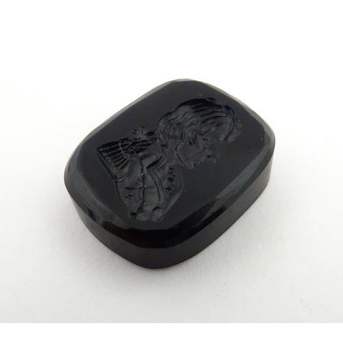 1271 - A 19thC black hardstone intaglio depicting a portrait of Nelson. Approx. 1