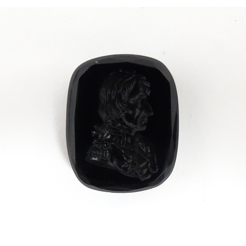 1271 - A 19thC black hardstone intaglio depicting a portrait of Nelson. Approx. 1