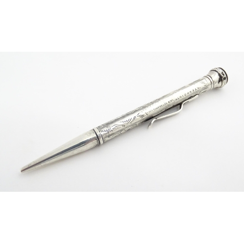 1278 - An Everpoint silver propelling pencil with engraved decoration, marked Sterling. Approx. 4