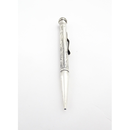 1278 - An Everpoint silver propelling pencil with engraved decoration, marked Sterling. Approx. 4