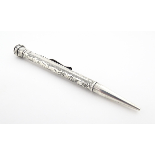 1278 - An Everpoint silver propelling pencil with engraved decoration, marked Sterling. Approx. 4