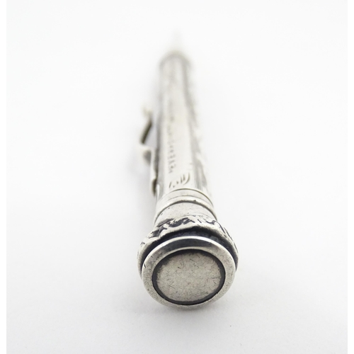 1278 - An Everpoint silver propelling pencil with engraved decoration, marked Sterling. Approx. 4