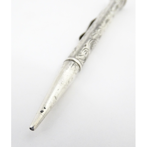 1278 - An Everpoint silver propelling pencil with engraved decoration, marked Sterling. Approx. 4