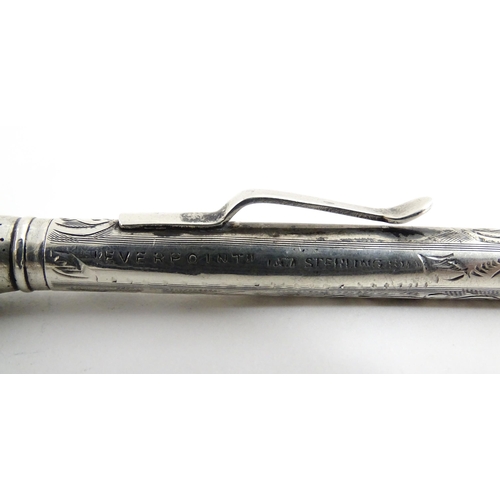 1278 - An Everpoint silver propelling pencil with engraved decoration, marked Sterling. Approx. 4