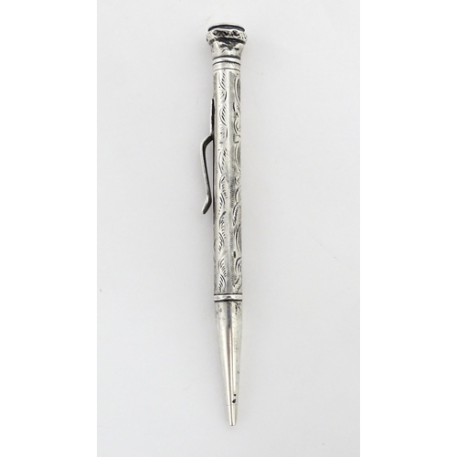 1278 - An Everpoint silver propelling pencil with engraved decoration, marked Sterling. Approx. 4