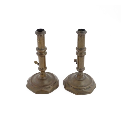 1279 - A pair of 19thC brass ejector candlesticks. Approx. 6 1/2