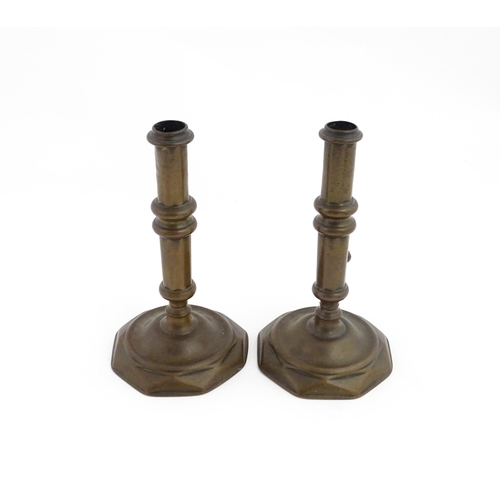 1279 - A pair of 19thC brass ejector candlesticks. Approx. 6 1/2