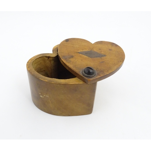 1280 - Treen : A late 19thC box of heart form with swivel lid, the top with applied lozenge engraved W. Web... 