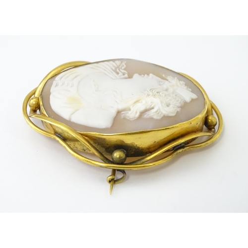 693 - A quantity of jewellery etc. to include a 19thC shell carved cameo brooch in gilt metal mount, brace... 