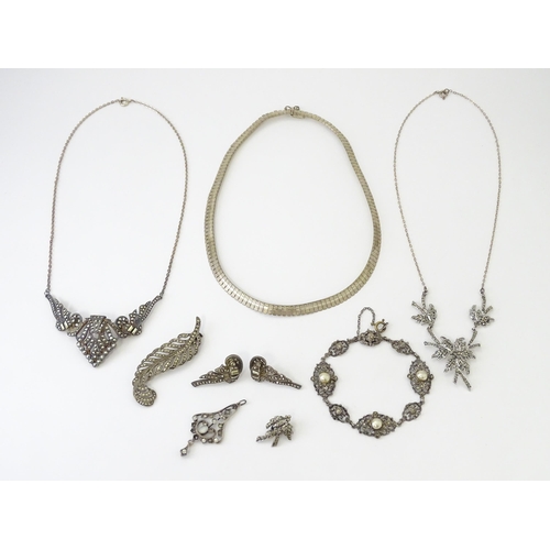 694 - A quantity of silver and white metal marcasite and paste stone jewellery to include necklaces, brace... 