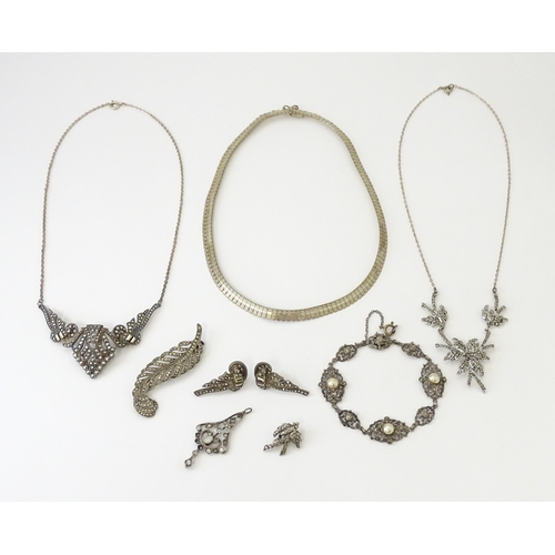 694 - A quantity of silver and white metal marcasite and paste stone jewellery to include necklaces, brace... 