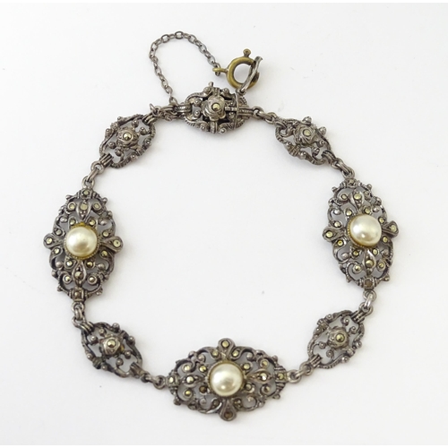 694 - A quantity of silver and white metal marcasite and paste stone jewellery to include necklaces, brace... 