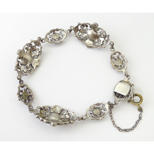 694 - A quantity of silver and white metal marcasite and paste stone jewellery to include necklaces, brace... 