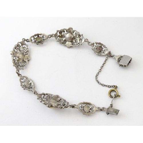 694 - A quantity of silver and white metal marcasite and paste stone jewellery to include necklaces, brace... 