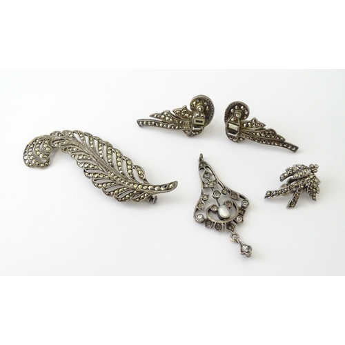 694 - A quantity of silver and white metal marcasite and paste stone jewellery to include necklaces, brace... 