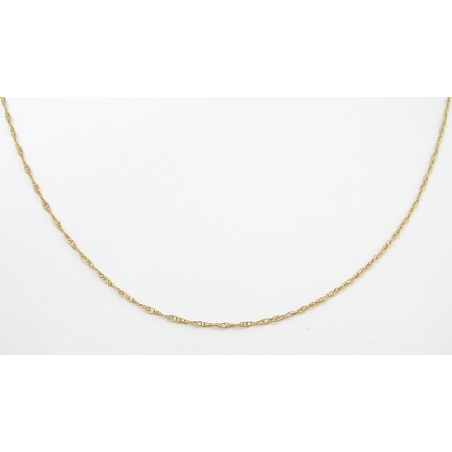 698 - Two 9ct gold chains. Together with two silver chains. Gold chains approx. 18