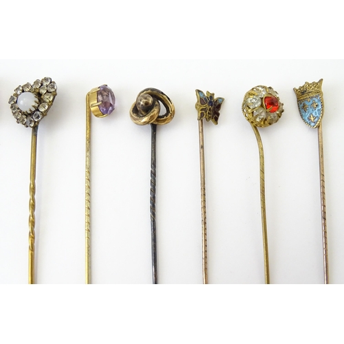 703 - Assorted Victorian and later stick pins to include yellow and white metal examples, etc. (19)