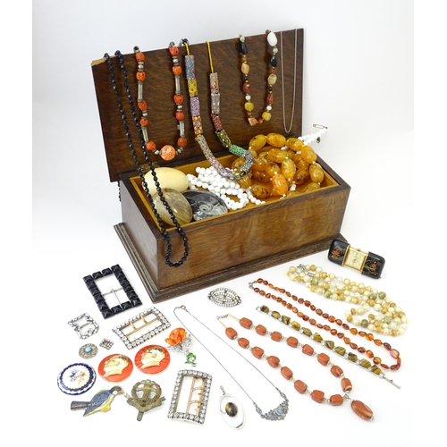 706 - A quantity of assorted costume jewellery to include various bead necklaces including Venetian beads,... 