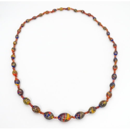 714 - A vintage graduated bead necklace in the Venetian style. Approx. 36