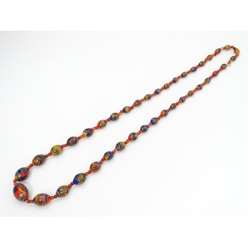 714 - A vintage graduated bead necklace in the Venetian style. Approx. 36