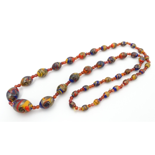 714 - A vintage graduated bead necklace in the Venetian style. Approx. 36