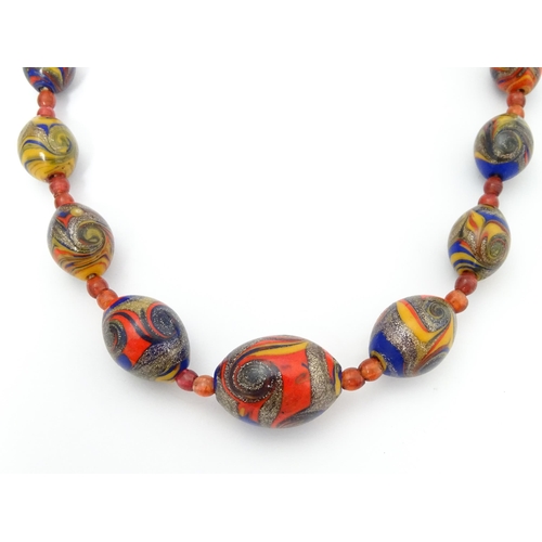 714 - A vintage graduated bead necklace in the Venetian style. Approx. 36