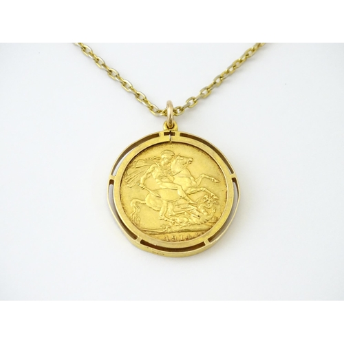 720 - Coin: A 1914 George V gold sovereign in yellow metal captive pendant mount, with 22