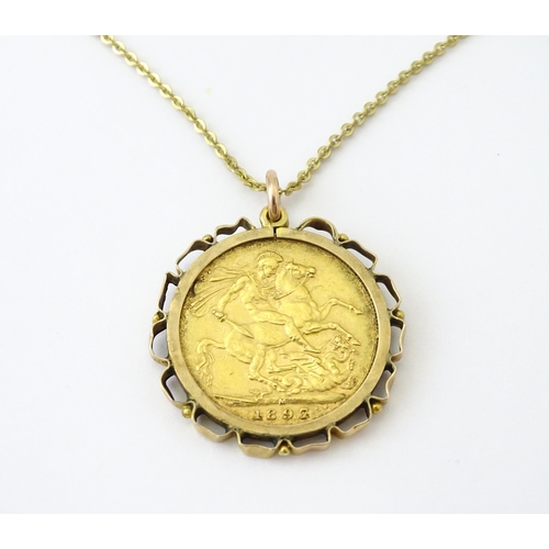 721 - Coin: An 1897 Victorian gold sovereign in yellow metal captive pendant mount, with 18