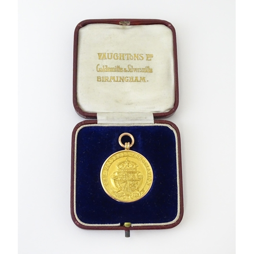 728 - Football Interest : A cased 9ct gold medal / fob for The Football Association Amateur Cup Winners, h... 