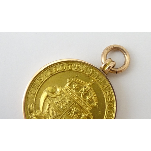 728 - Football Interest : A cased 9ct gold medal / fob for The Football Association Amateur Cup Winners, h... 