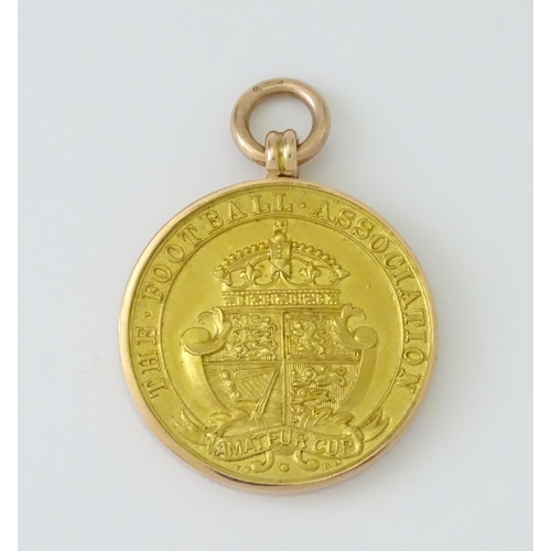 728 - Football Interest : A cased 9ct gold medal / fob for The Football Association Amateur Cup Winners, h... 