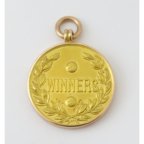 728 - Football Interest : A cased 9ct gold medal / fob for The Football Association Amateur Cup Winners, h... 