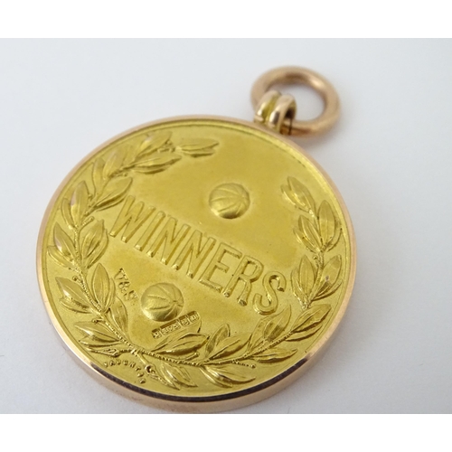 728 - Football Interest : A cased 9ct gold medal / fob for The Football Association Amateur Cup Winners, h... 