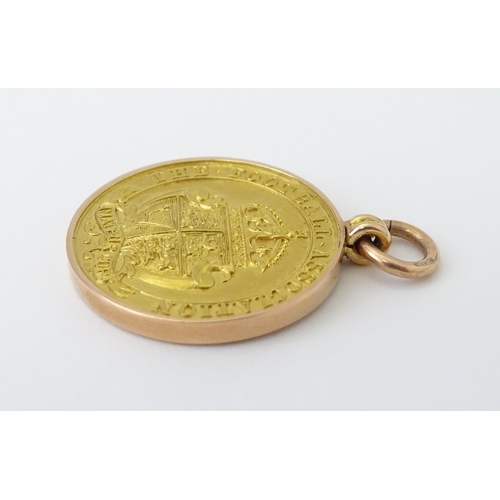 728 - Football Interest : A cased 9ct gold medal / fob for The Football Association Amateur Cup Winners, h... 