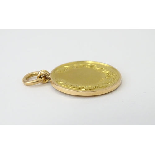 729 - Football Interest : A cased 15ct gold medal / fob for London Football Association Challenge Cup, hal... 