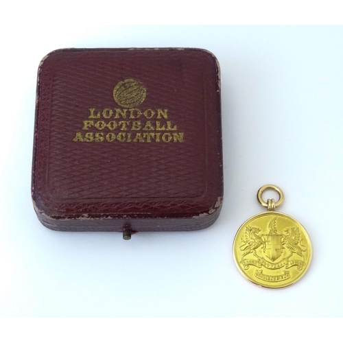 729 - Football Interest : A cased 15ct gold medal / fob for London Football Association Challenge Cup, hal... 