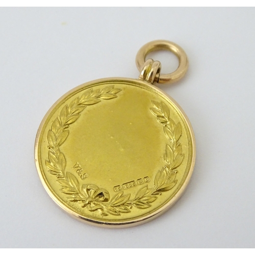 729 - Football Interest : A cased 15ct gold medal / fob for London Football Association Challenge Cup, hal... 