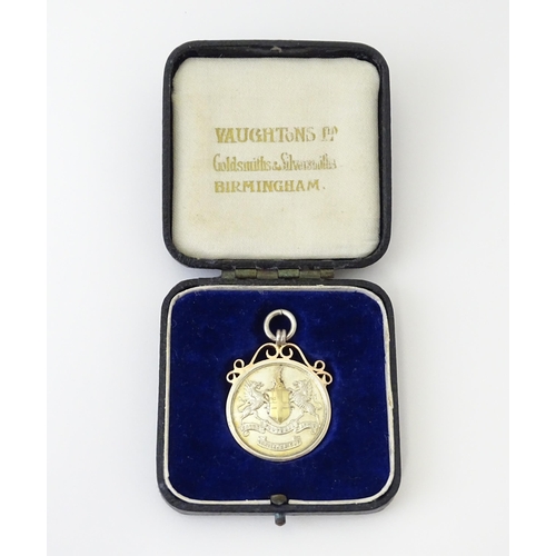 730 - Football Interest : A cased silver medal / fob for London Football Association Challenge Cup, hallma... 