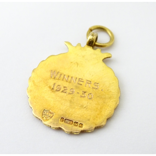 733 - Football Interest : A cased 9ct gold medal / fob with enamel decoration for Ilford Hospital Charity ... 