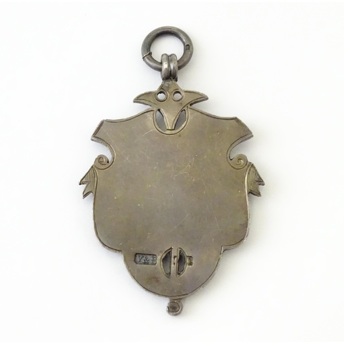 738 - Football Interest : A silver medal / fob with enamel decoration for Chelmsford Charity Cup Comptn (C... 