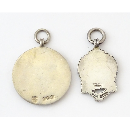 740 - Football Interest: Two silver and enamel fobs / medals, one for Ilford Hospital Charity Compt, the o... 