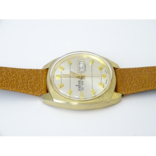 744 - A Josmar gentlemans automatic wristwatch with day date aperture and 21 jewel movement. Dial approx. ... 