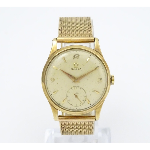 746 - A 9ct gold cased 1950s Omega gentlemans manual wind wristwatch with subsidiary seconds dial, the cas... 