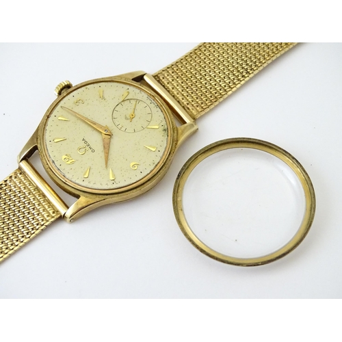 746 - A 9ct gold cased 1950s Omega gentlemans manual wind wristwatch with subsidiary seconds dial, the cas... 