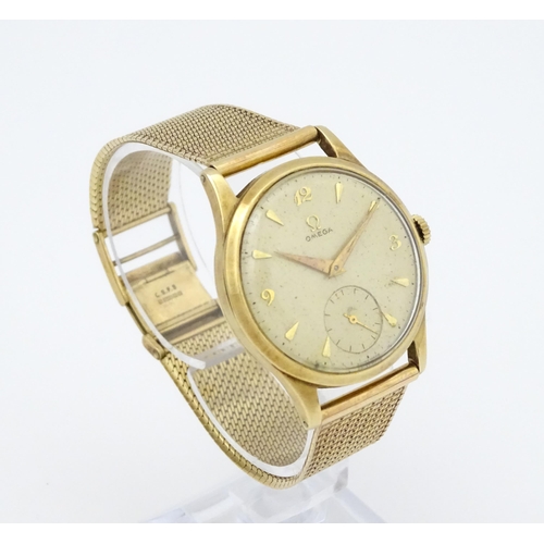 746 - A 9ct gold cased 1950s Omega gentlemans manual wind wristwatch with subsidiary seconds dial, the cas... 