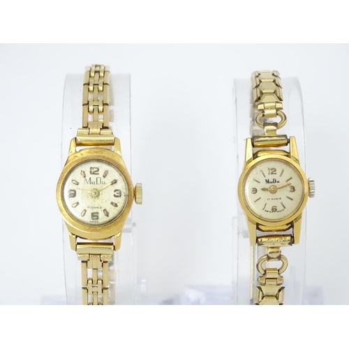 748 - Two 18ct gold cased ladies manual wind wristwatches by MuDu. Largest dial approx. 1/2