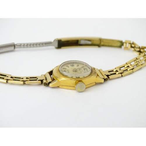 748 - Two 18ct gold cased ladies manual wind wristwatches by MuDu. Largest dial approx. 1/2