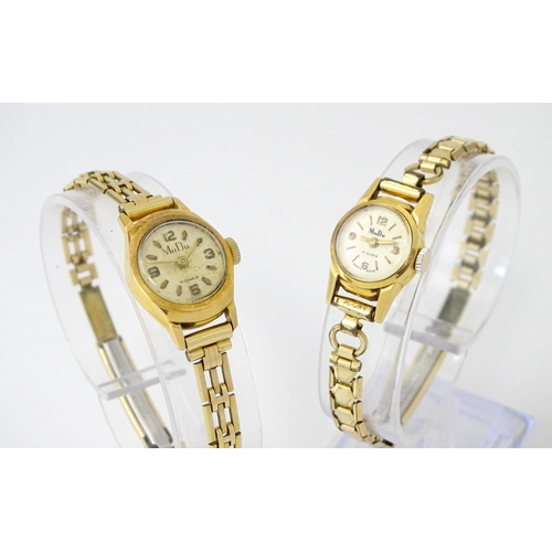 748 - Two 18ct gold cased ladies manual wind wristwatches by MuDu. Largest dial approx. 1/2