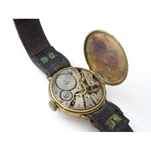 758 - Seven assorted wristwatches and movements to include a ladies 9ct gold cased Avia wristwatch, a gent... 