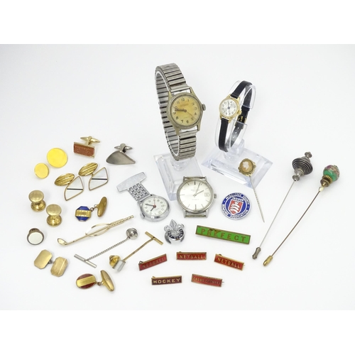 759 - A quantity of assorted items to include various studs, badges, cufflinks, etc. Together with two hat... 